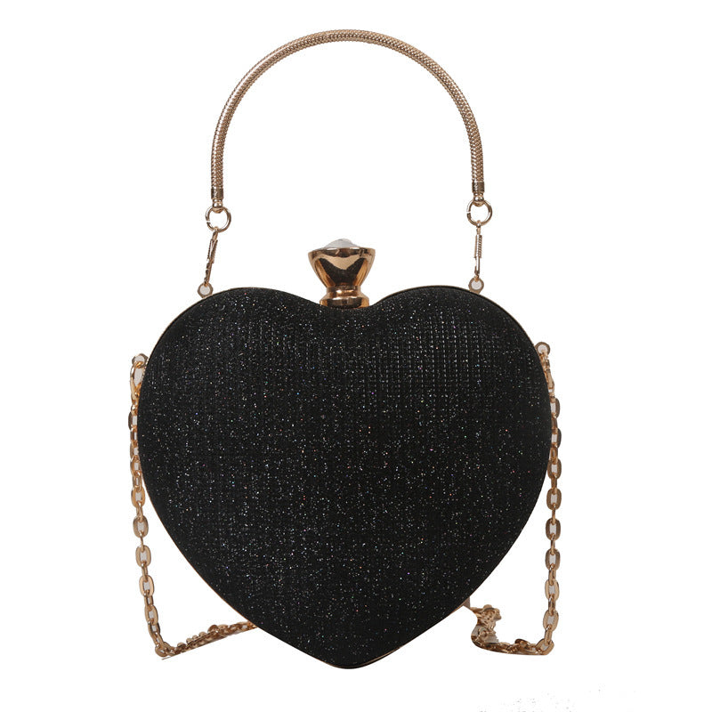 Herzförmige glänzende Clutch mit Kette