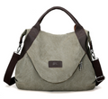 Grosse blaue Canvas-Schultertasche mit Kontrastgriffen