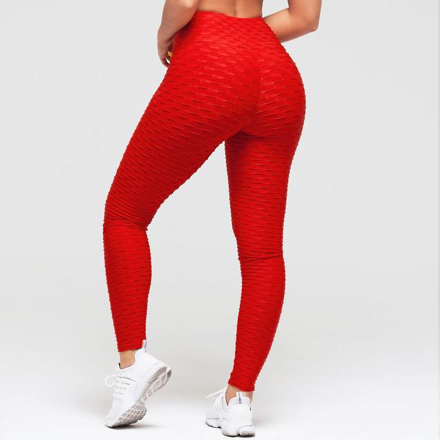 Frau in Scrunch Leggings mit hoher Taille