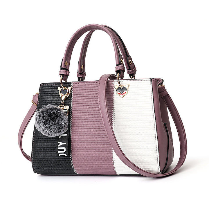 Colour-Block-Handtasche mit Pompon-Anhänger