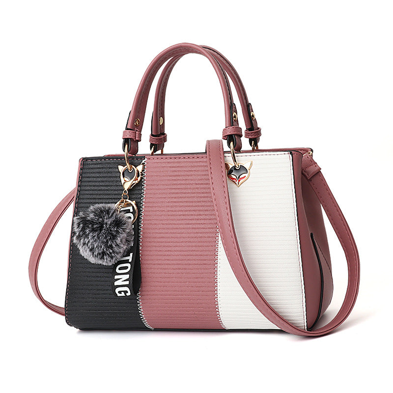 Colour-Block-Handtasche mit Pompon-Anhänger