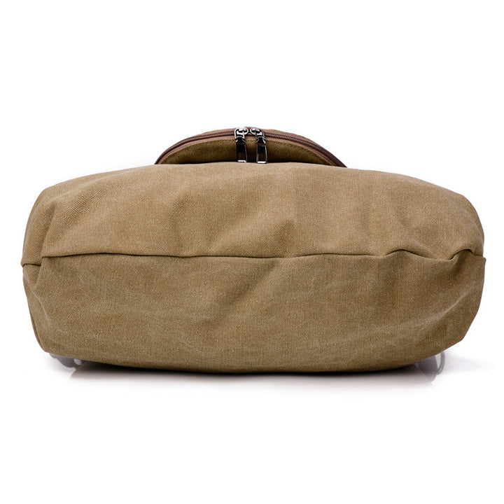 Grosse blaue Canvas-Schultertasche mit Kontrastgriffen