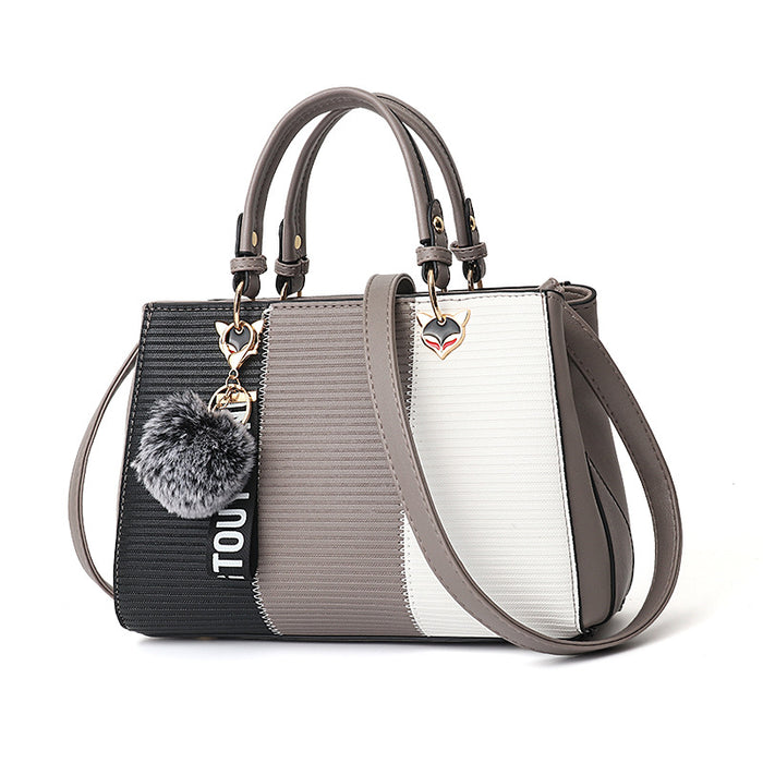 Sophie | Colour-Block-Handtasche mit Pompon-Anhänger