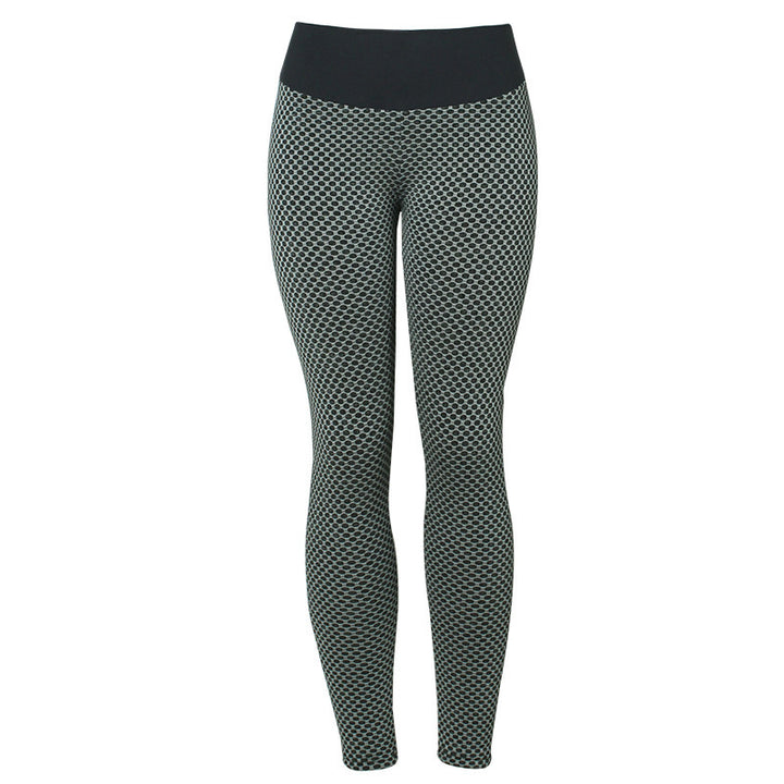 Frau in nahtloser Leggings mit Wabenstruktur