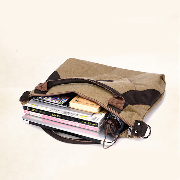 Grosse blaue Canvas-Schultertasche mit Kontrastgriffen