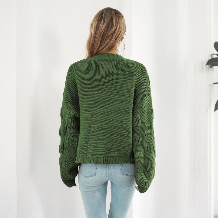 Kurze Grobstrickjacke mit Puffärmeln in Senfgelb