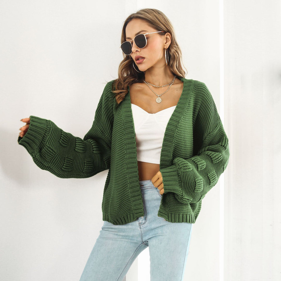 Kurze Grobstrickjacke mit Puffärmeln in Senfgelb