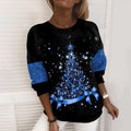 Frau im Weihnachts-Sweatshirt mit Glitzer-Tannenbaum