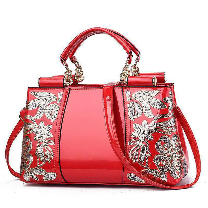 Lack-Handtasche mit Pailletten-Blumenstickerei