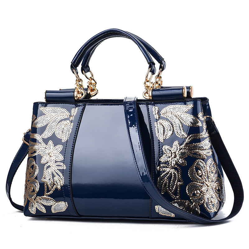 Lack-Handtasche mit Pailletten-Blumenstickerei