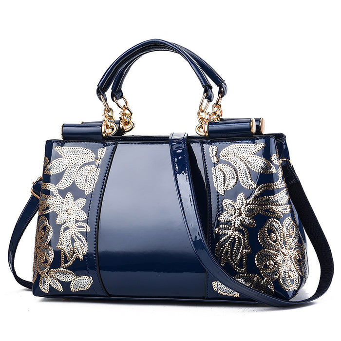 Nina | Lack-Handtasche mit Pailletten-Blumenstickerei
