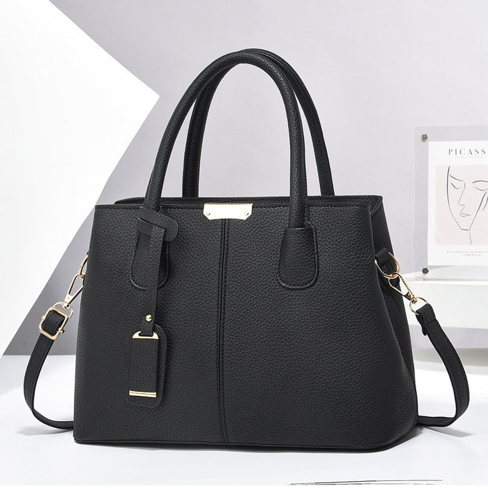 Lea | Eckige Kunstleder-Handtasche mit Henkeln und Schulterriemen
