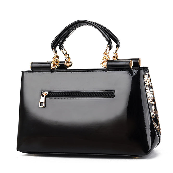 Lack-Handtasche mit Pailletten-Blumenstickerei