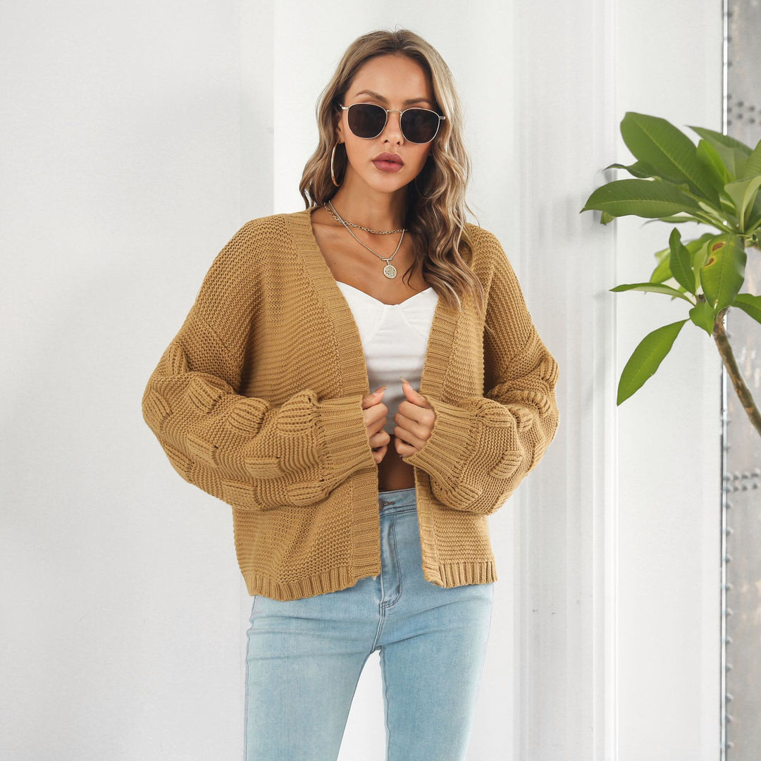Kurze Grobstrickjacke mit Puffärmeln in Senfgelb