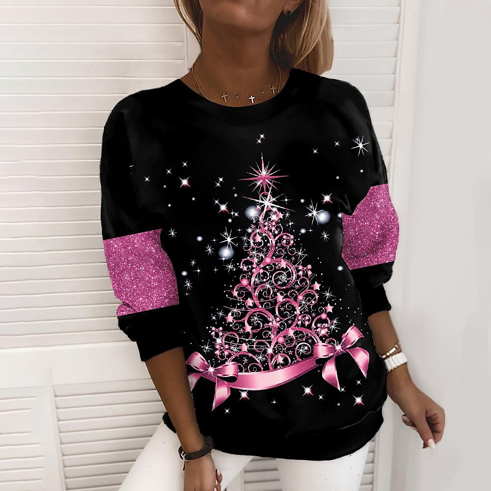 Frau im Weihnachts-Sweatshirt mit Glitzer-Tannenbaum
