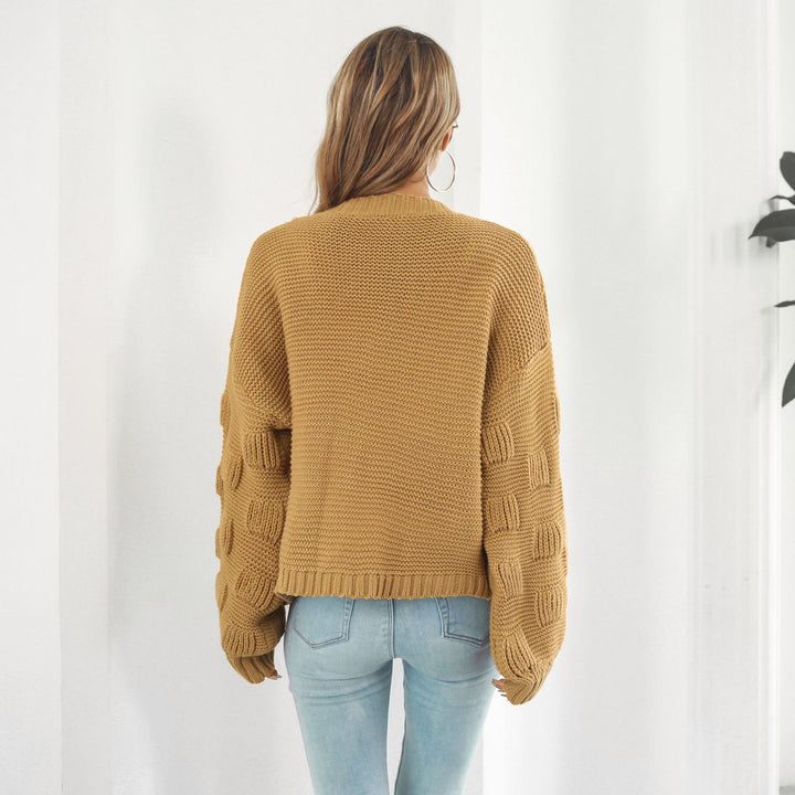 Kurze Grobstrickjacke mit Puffärmeln in Senfgelb
