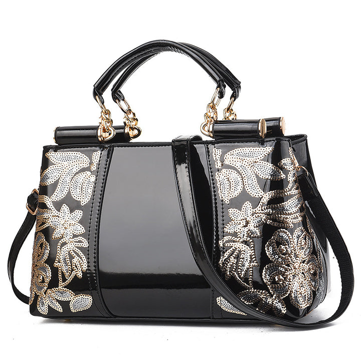 Lack-Handtasche mit Pailletten-Blumenstickerei